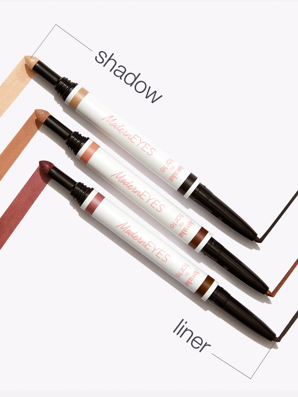 Eyebrow pencils with 'shadow' and 'liner' labels on a white background