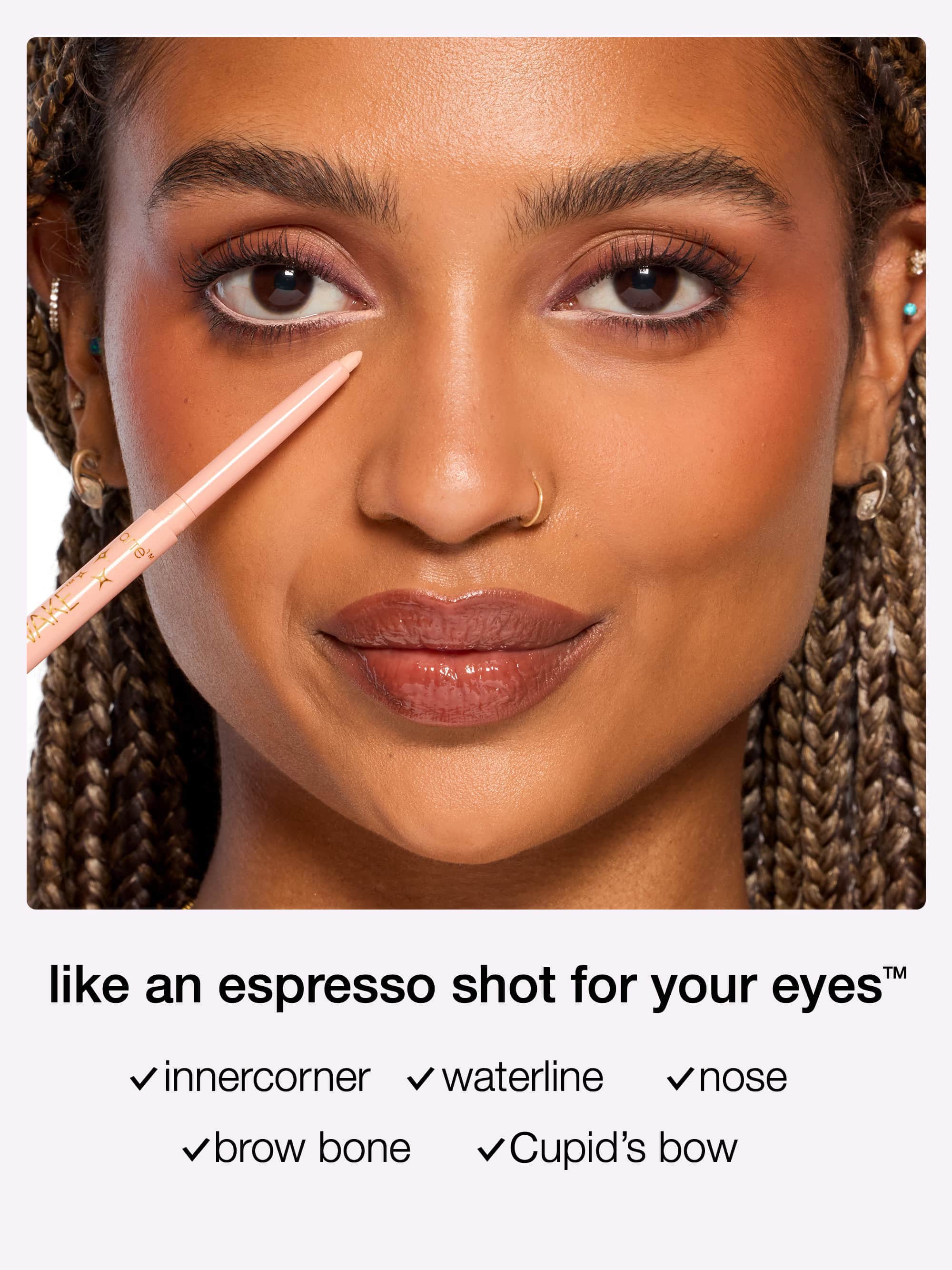 Close-up of a woman's face with application of tarte fake awake eye highlight tools and text overlay.