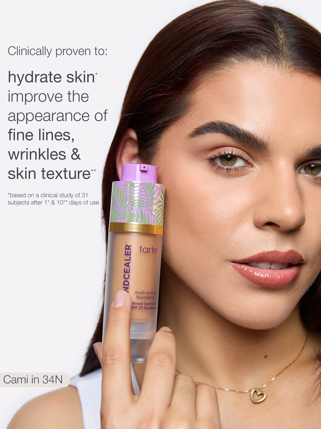 Woman holding a cosmetic bottle with text about skincare benefits on a white background