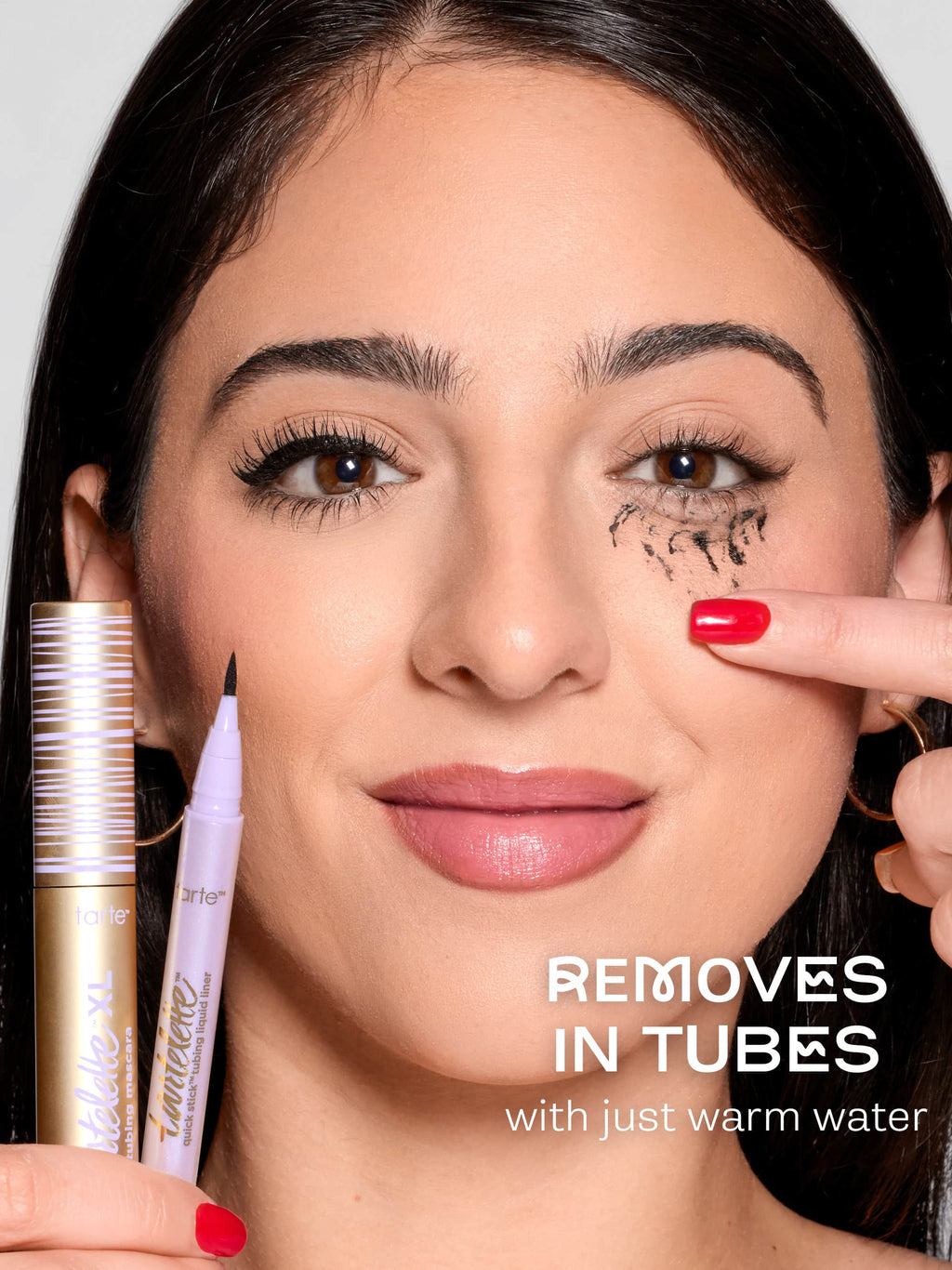 Woman with makeup removed using tartelette quick stick tubing liner, with text indicating it removes makeup with just warm water.