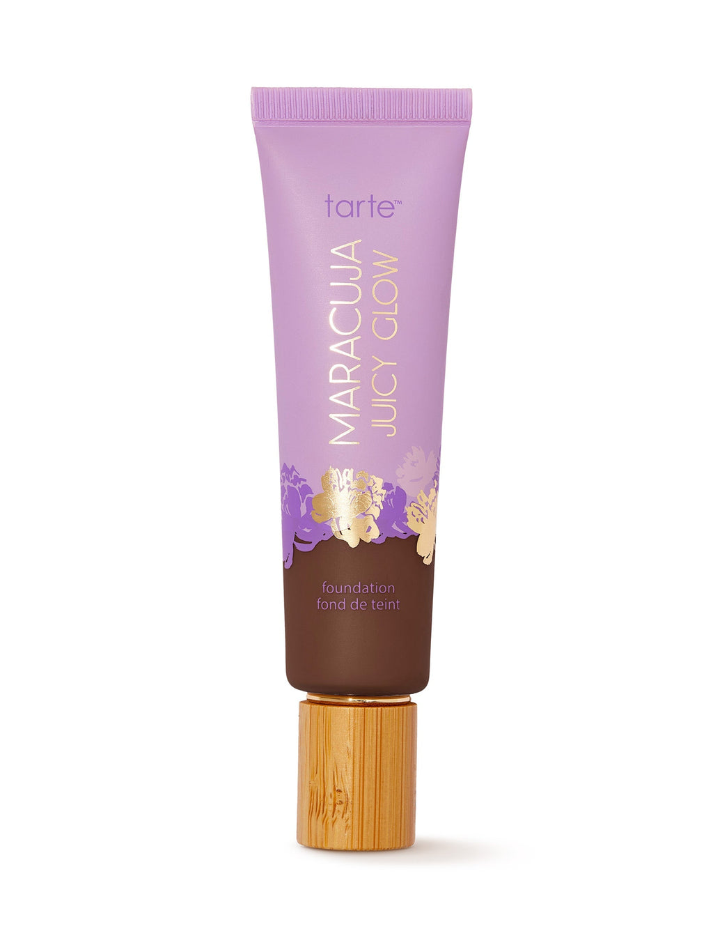 Tarte Maracuja Juicy Glow foundation tube with purple cap on a white background