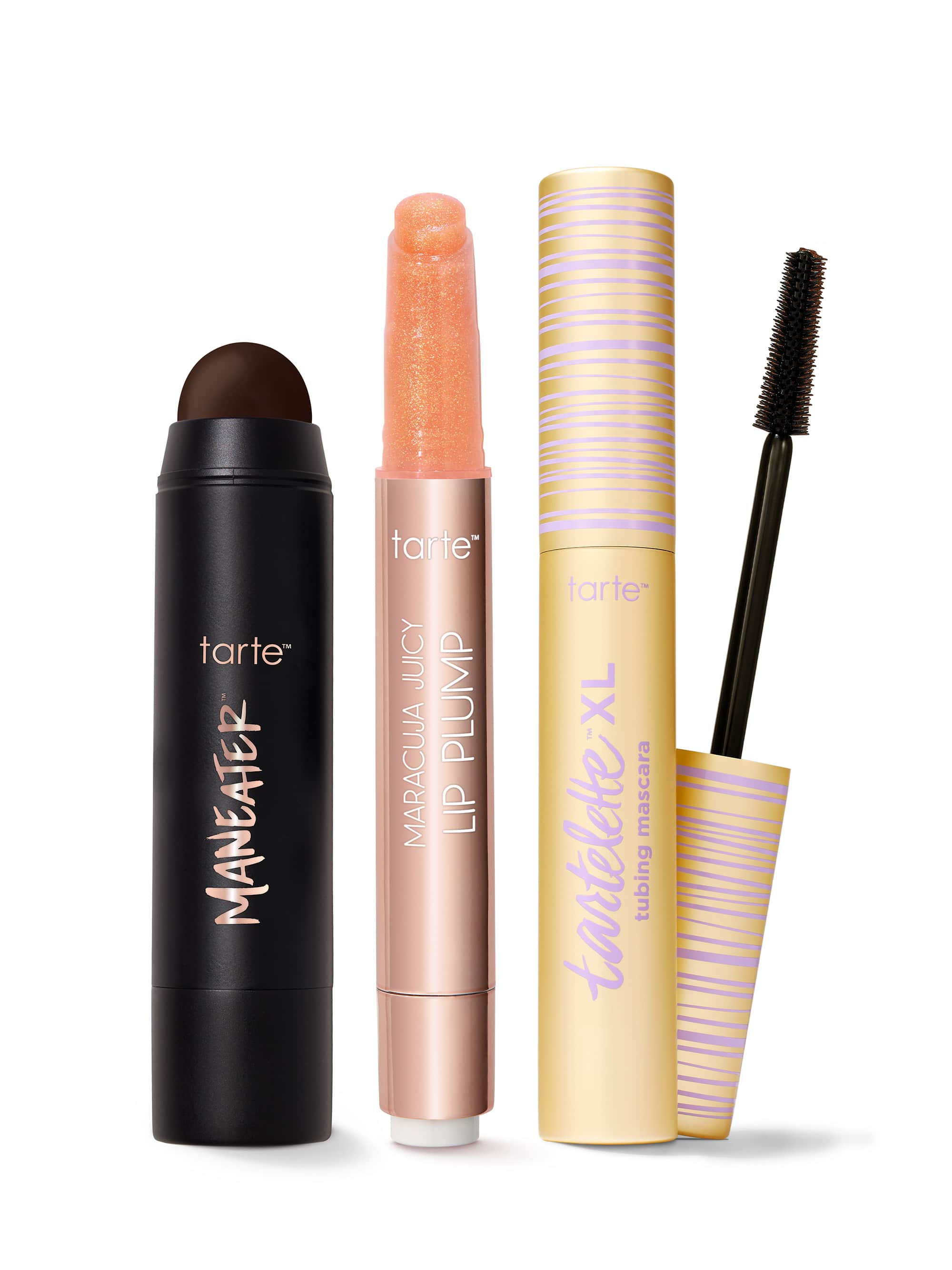 Set of tarte makeup products including maneater silk stick bronzer, maracuja juicy lip plump, and tartelette tubing XL mascara