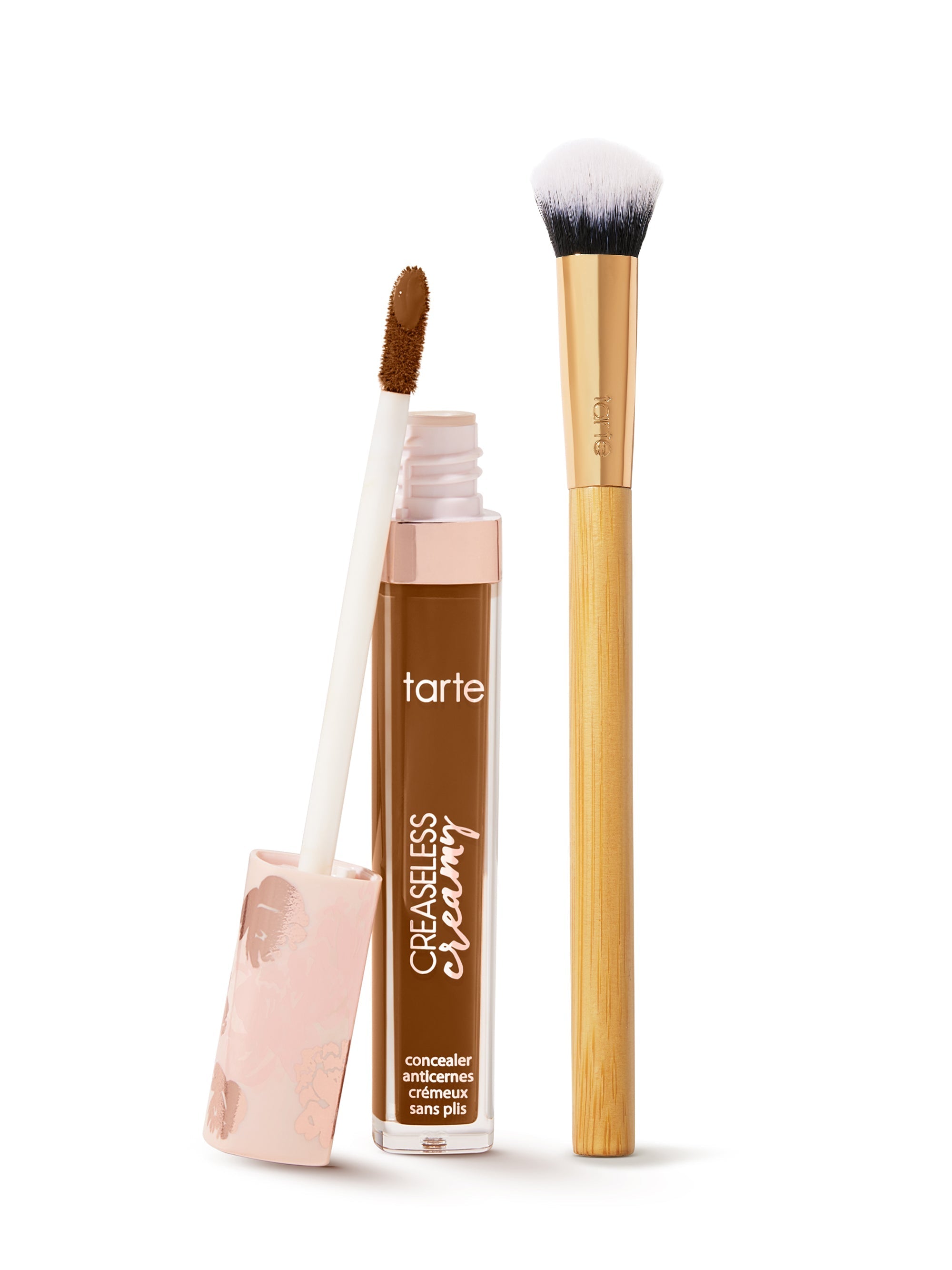 tarte creaseless creamy concealer  and brush on a white background