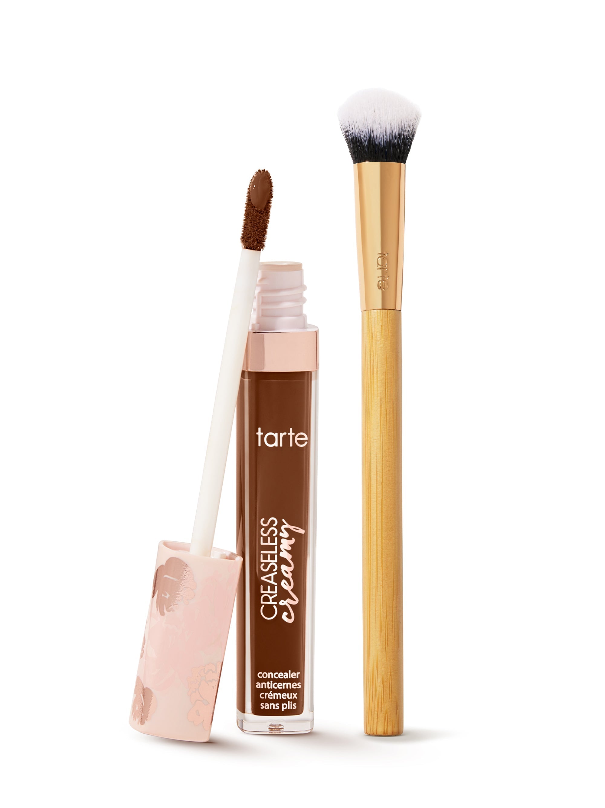  tarte creaseless creamy concealer   with applicator and brush on a white background