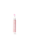 Pink skincare mask tube on a white background