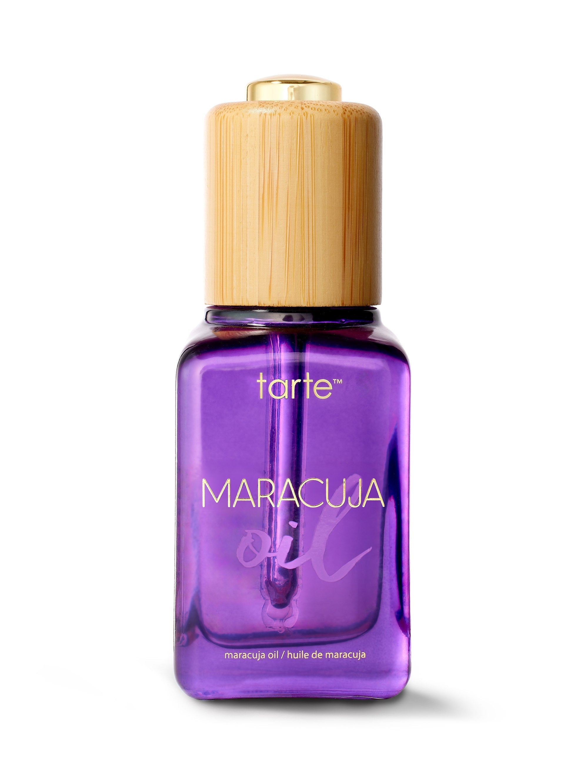 Tarte Maracuja oil bottle with wooden cap on a white background