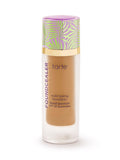 Tarte foundation bottle with a colorful cap on a white background