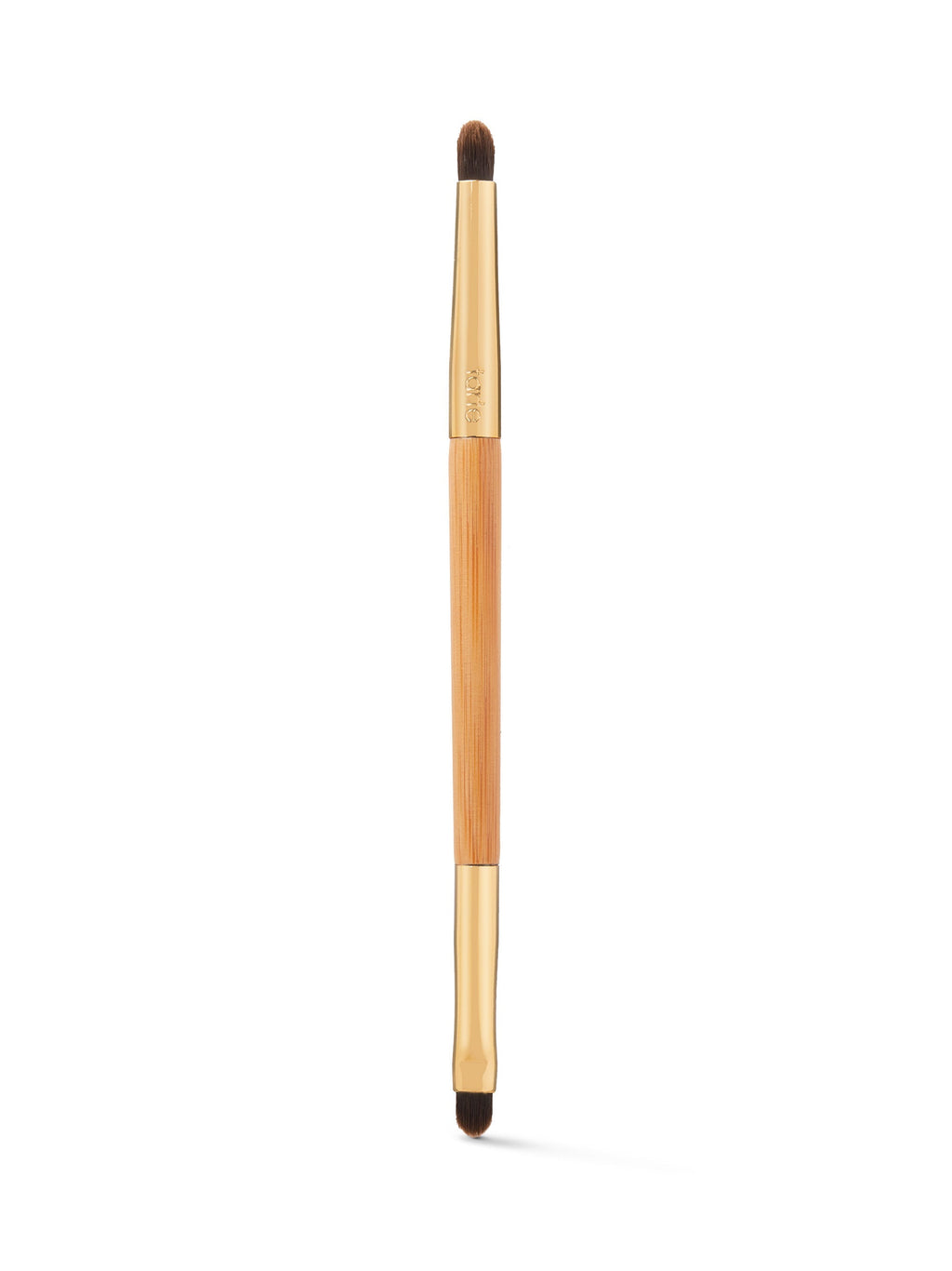 Makeup brush with wooden handle and black bristles on a white background