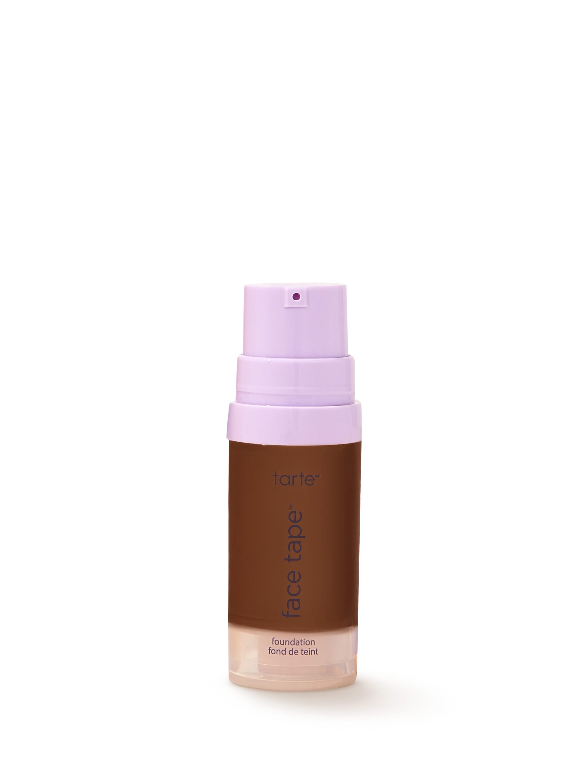 Tarte foundation bottle with purple cap on a white background