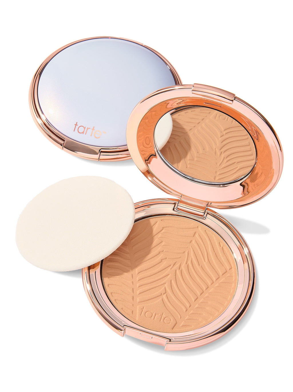 Tarte powdered makeup in a compact on a white background